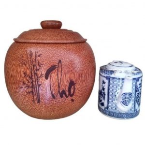 bình trà gỗ dừa gọn đẹp khắc hoa văn lồng chữ Thọ